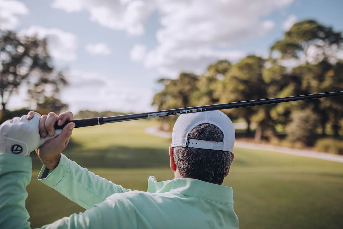 Golfer Finishes Swing Using a Driver Equipped with a Steadfast Affordable Carbon Fiber Golf Shaft