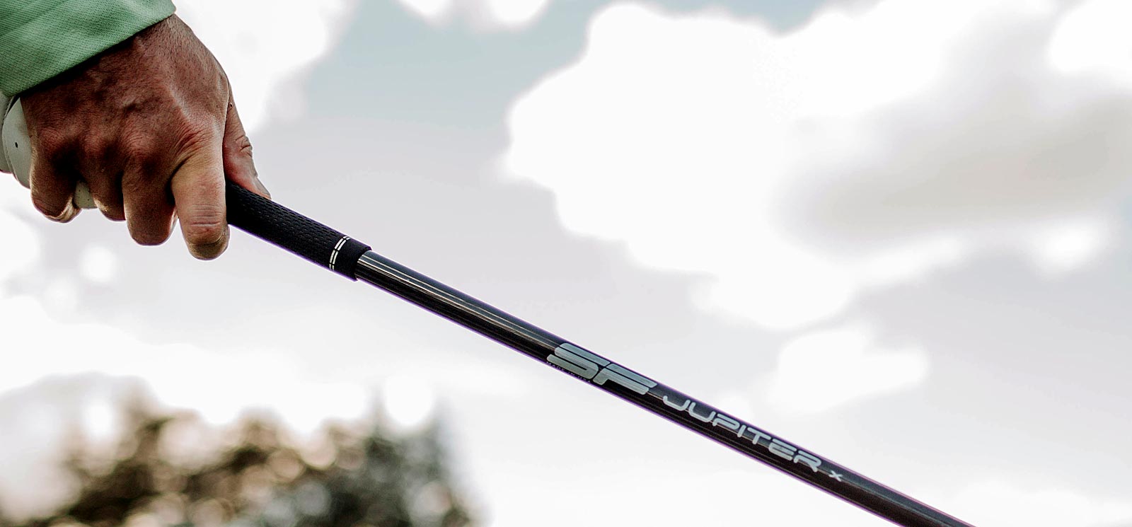 Golfer's Hands Holding a Driver With a Steadfast Jupiter Shaft